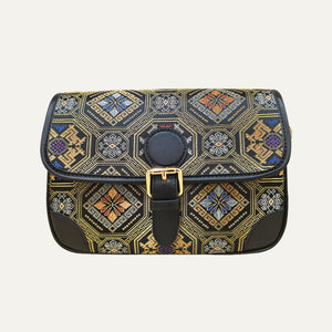 Phoenix Butterfly brocade-inspired baguette bag front view on soft neutral background