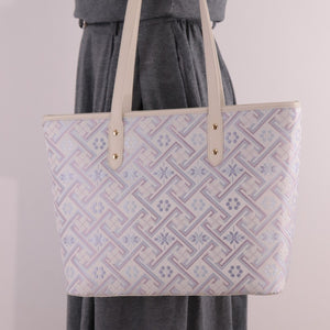 Model carrying silver purple Zhuang brocade mother-daughter bag set