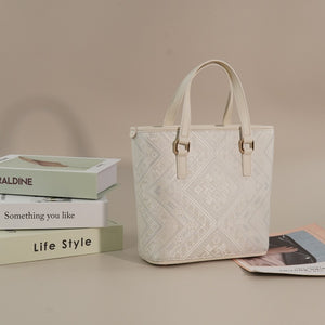 Ivory White brocade tote bag in lifestyle scene