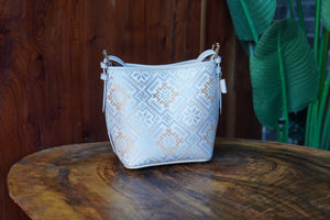 Multicolor brocade bucket bag in lifestyle scene