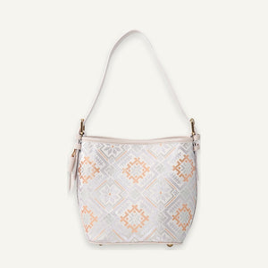 Ivory Four Swallows brocade-inspired bucket bag front view