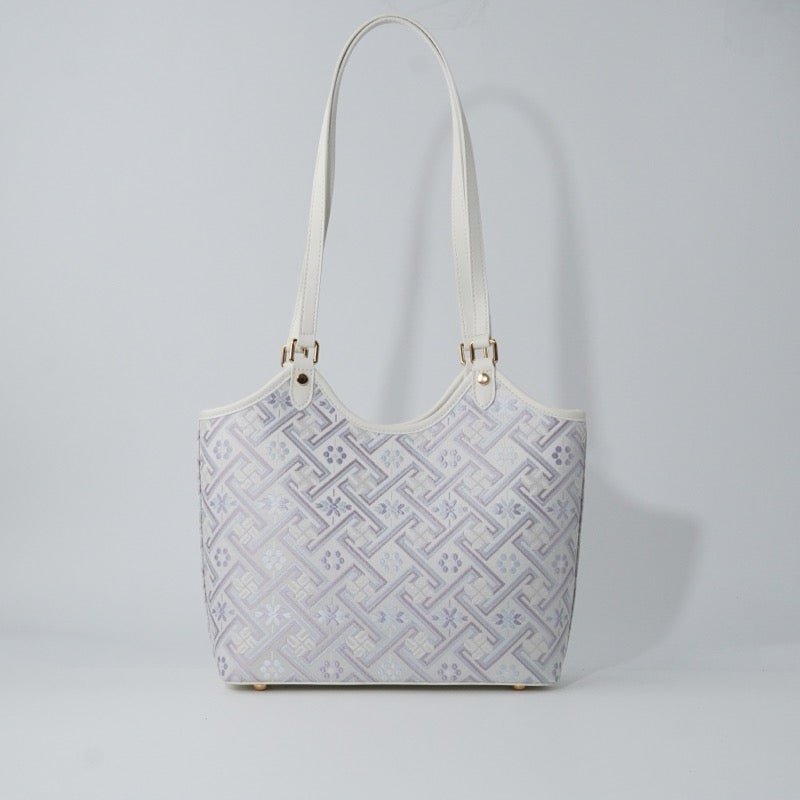 Ivory Wanjie brocade-inspired basket tote bag front view