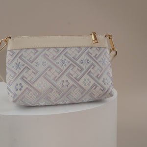 Silver lavender Wanjie brocade-inspired crossbody bag side detail view