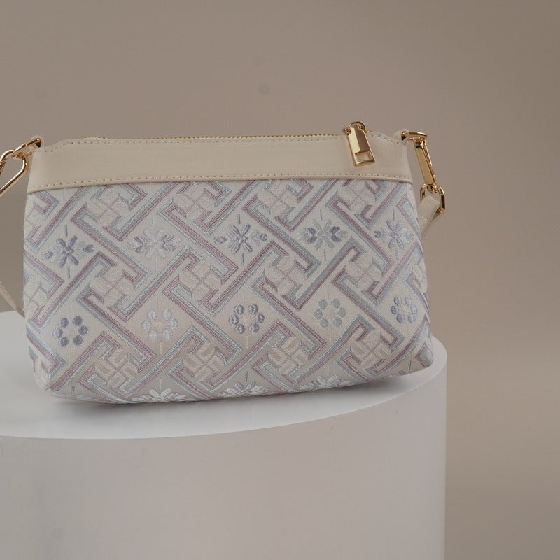 Silver lavender Wanjie brocade-inspired crossbody bag side detail view