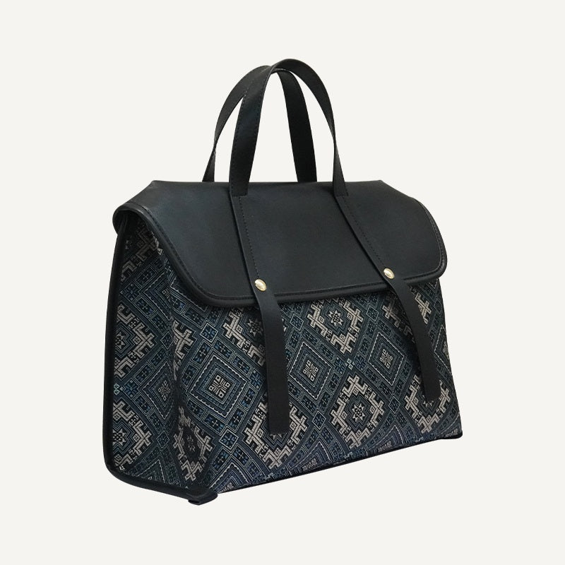 Flower and Swallow brocade-inspired backpack in black and blue