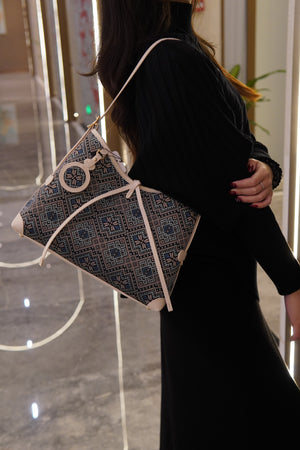Women's Deep Blue Zhuang Brocade Drawstring Shoulder Bag - model image 3