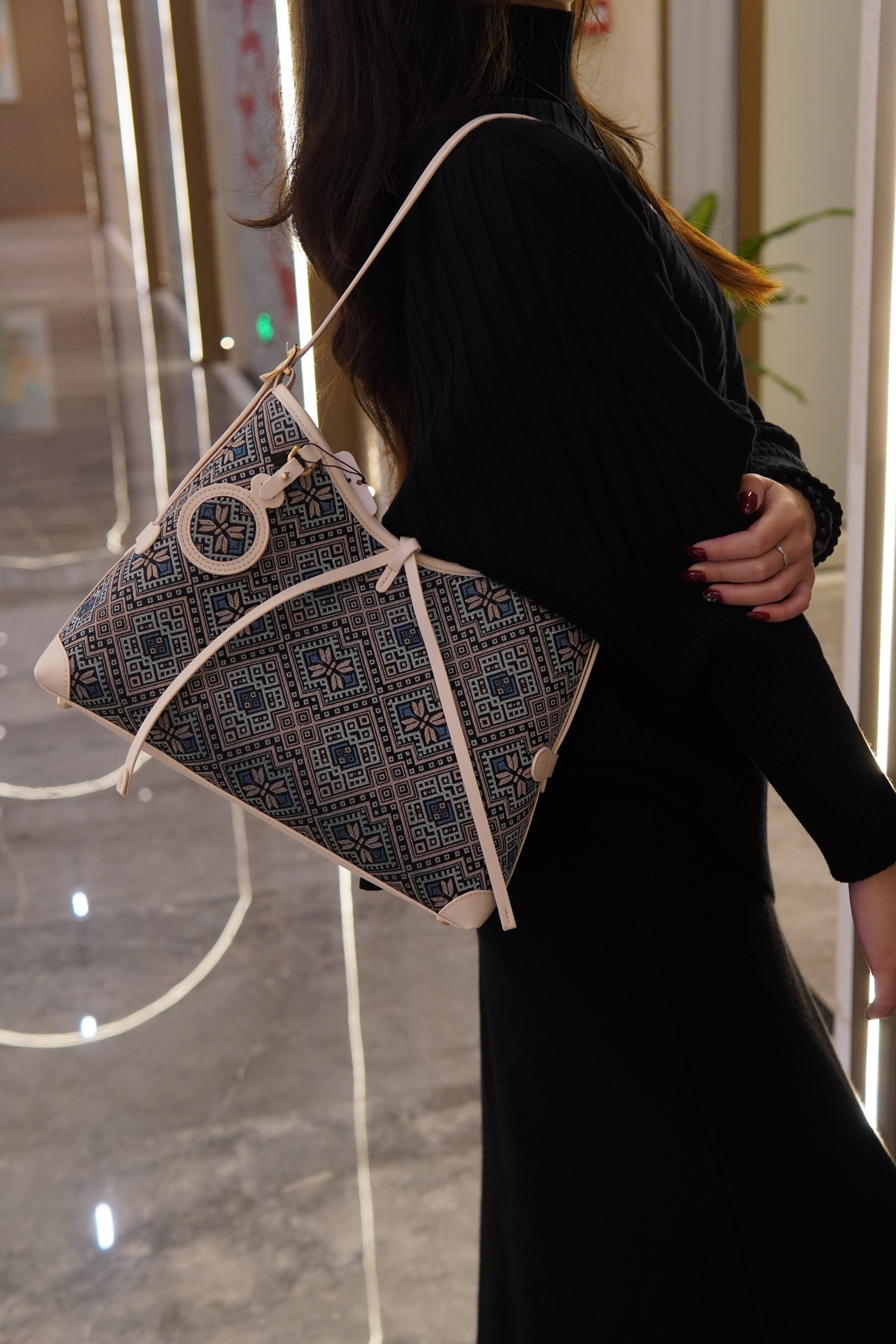 Women's Deep Blue Zhuang Brocade Drawstring Shoulder Bag - model image 3
