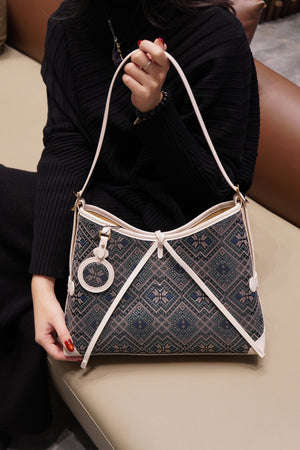 Women's Deep Blue Zhuang Brocade Drawstring Shoulder Bag - model image 7