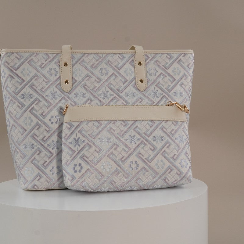 Silver purple Zhuang brocade bag set in indoor display setting