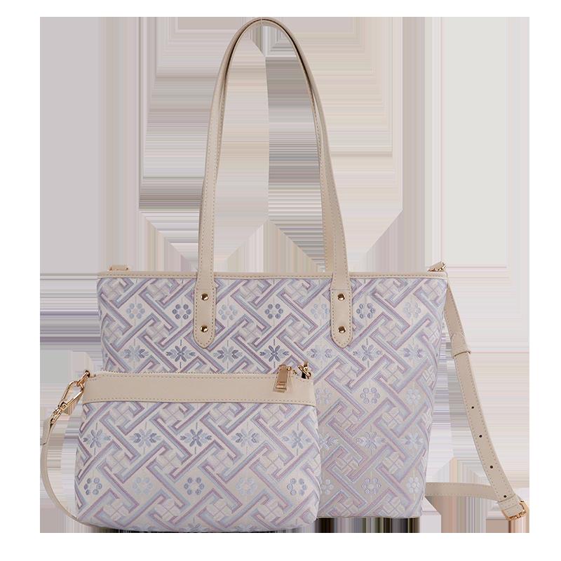 Silver purple Wanjie Zhuang brocade mother-daughter bag set front view