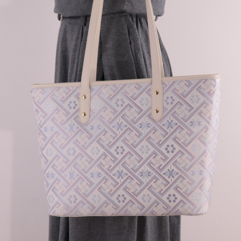 Model carrying silver purple Zhuang brocade mother-daughter bag set