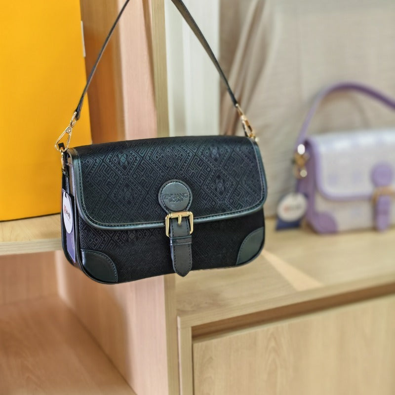 Black brocade baguette bag detail