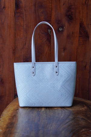 Ivory White brocade tote bag in lifestyle scene