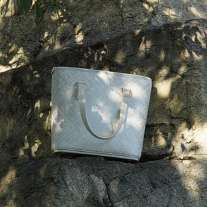 Ivory White brocade tote bag in lifestyle scene