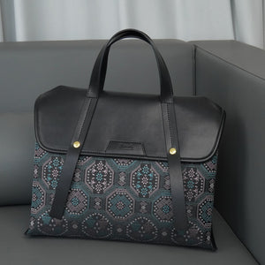 Multicolor brocade travel bag in lifestyle scene