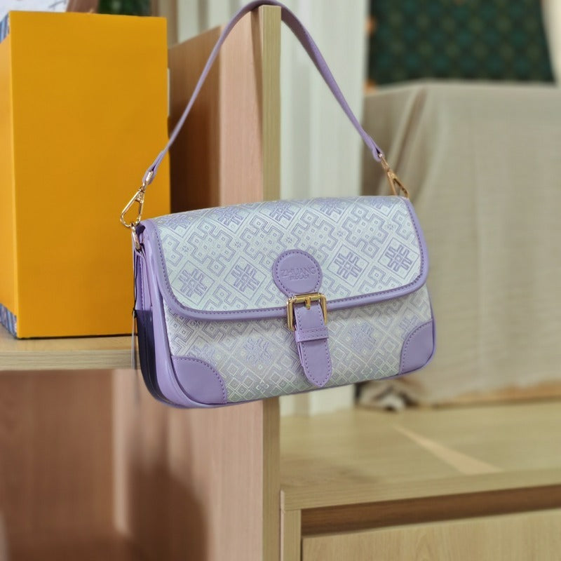 Purple brocade baguette bag detail