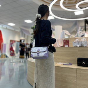 Purple brocade baguette bag detail