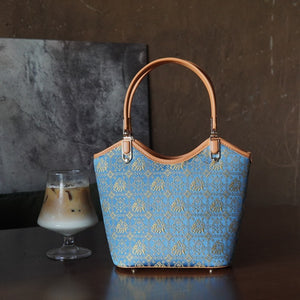 Royal Blue brocade shoulder bag in lifestyle scene
